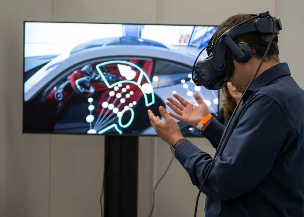 VR creates a 3D virtual environment and users experience the virtual world through a VR headset